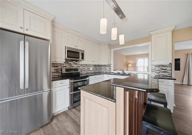 Photo 3 of Condo for sale at 824 S Chillicothe Rd #2, Aurora, OH 44202 | MLS# 5222107 | Listing updated on 2026-09-03