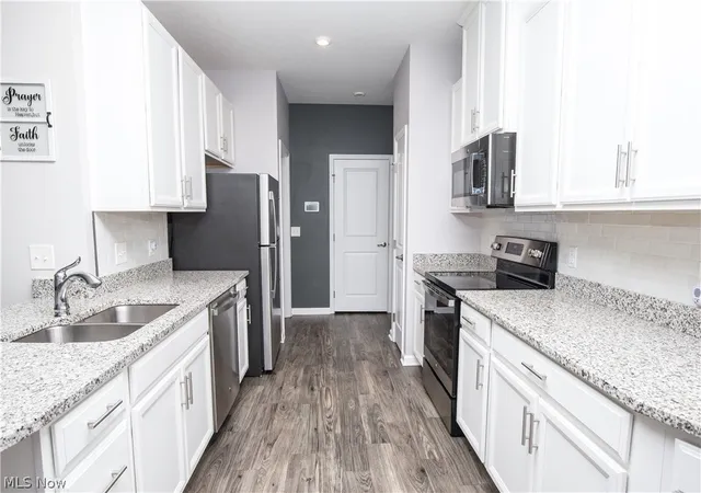 Photo 2 of Townhouse for sale at 1635 Springer Ct, Akron, OH 44313 | MLS# 5223094 | Listing updated on 2026-10-07