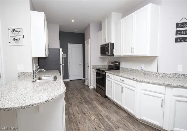 Photo 3 of Townhouse for sale at 1635 Springer Ct, Akron, OH 44313 | MLS# 5223094 | Listing updated on 2026-10-07