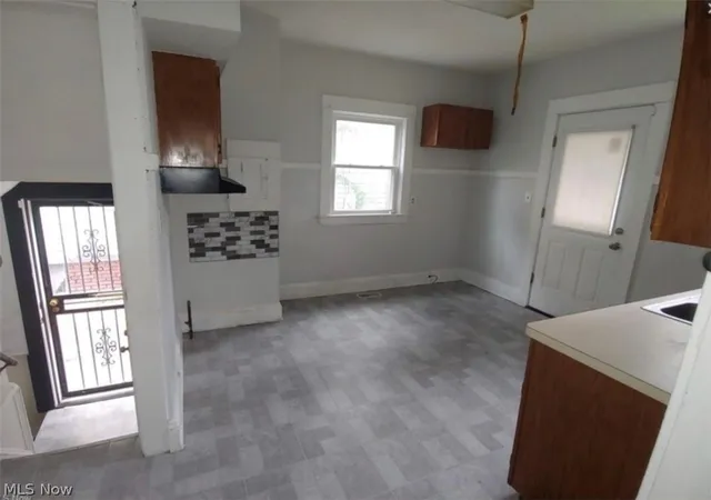 Photo 4 of Single family home for sale at 1169 Melbourne Rd, Cleveland, OH 44112 | MLS# 5227133 | Listing updated on 2026-09-13