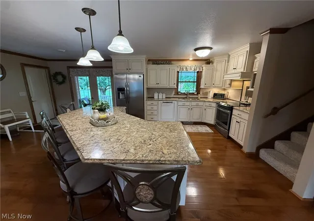 Photo 3 of Single family home for sale at 410 Stratton Ave SW, New Philadelphia, OH 44663 | MLS# 5229496 | Listing updated on 2026-09-26