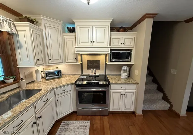 Photo 4 of Single family home for sale at 410 Stratton Ave SW, New Philadelphia, OH 44663 | MLS# 5229496 | Listing updated on 2026-09-26