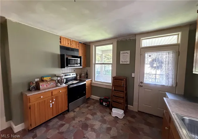 Photo 3 of Single family home for sale at 605 Mckinnon Ave, East Liverpool, OH 43920 | MLS# 5234181 | Listing updated on 2026-09-12