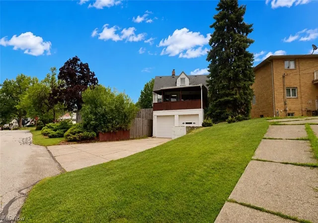 Photo 3 of Single family home for sale at 8423 Greenlawn Ave, Cleveland, OH 44129 | MLS# 5234314 | Listing updated on 2026-09-11
