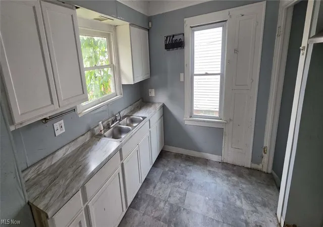 Photo 4 of Single family home for sale at 13420 Saybrook Ave, Garfield Heights, OH 44105 | MLS# 5234688 | Listing updated on 2026-09-14