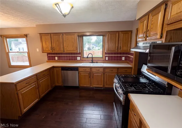 Photo 2 of Single family home for sale at 1100 Prescot Ave Nw, Massillon, OH 44646 | MLS# 5234829 | Listing updated on 2026-09-10