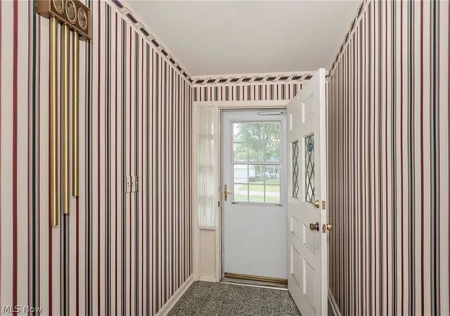 Photo 2 of Single family home for sale at 1987 Burlington Rd, Akron, OH 44313 | MLS# 5231548 | Listing updated on 2026-09-11