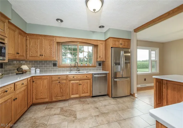 Photo 3 of Single family home for sale at 496 Howe Rd, Kent, OH 44240 | MLS# 5236478 | Listing updated on 2026-09-23