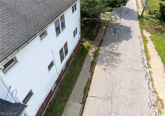 Photo 2 of Multi family home for sale at 14002 Idarose Ave, Cleveland, OH 44110 | MLS# 5233899 | Listing updated on 2026-09-30