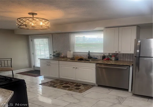 Photo 4 of Single family home for sale at 20274 Emery Rd, Cleveland, OH 44128 | MLS# 5237976 | Listing updated on 2026-09-05