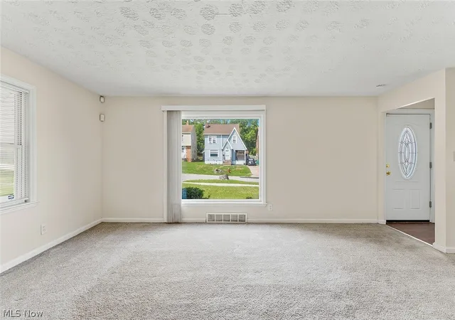 Photo 3 of Single family home for sale at 19316 Milan Dr, Maple Heights, OH 44137 | MLS# 5238263 | Listing updated on 2026-09-10