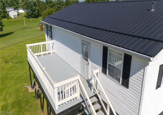 Photo 4 of Single family home for sale at 58915 Homco Rd, Jacobsburg, OH 43933 | MLS# 5238759 | Listing updated on 2026-10-02
