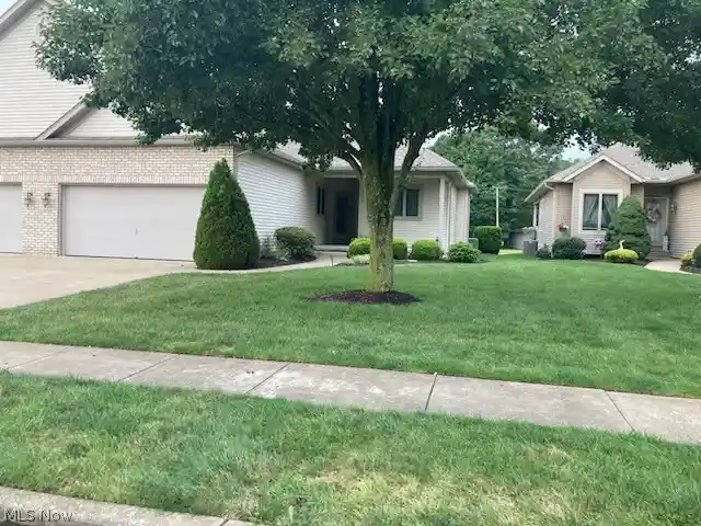 Listing Photo 1 - Condo for sale in 1322 Meadowbrook Dr located at 1322 Meadowbrook Dr, Dover, OH 44622 - Unit 1322 Meadowbrook Dr