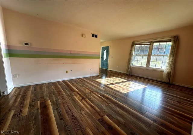 Photo 2 of Single family home for sale at 286 Wildwood Ave, Akron, OH 44320 | MLS# 5240540 | Listing updated on 2026-10-07