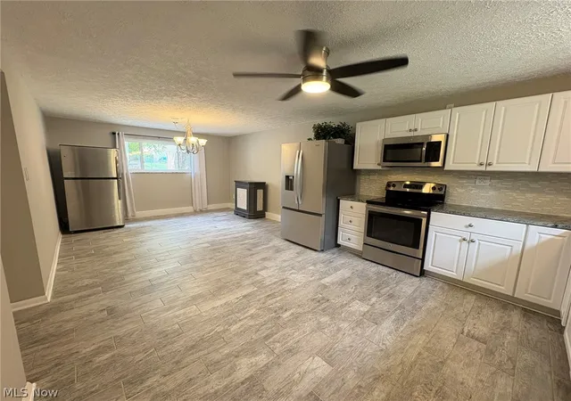 Photo 3 of Single family home for sale at 1351 Winhurst Dr, Akron, OH 44313 | MLS# 5217835 | Listing updated on 2026-10-01
