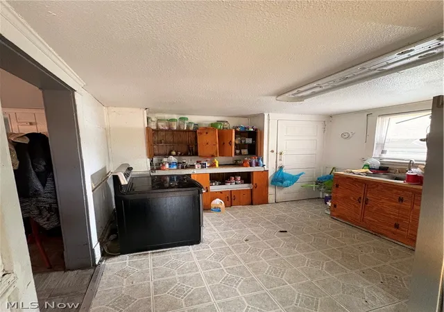 Photo 2 of Single family home for sale at 9915 Raymond Ave, Cleveland, OH 44104 | MLS# 5241468 | Listing updated on 2026-09-15