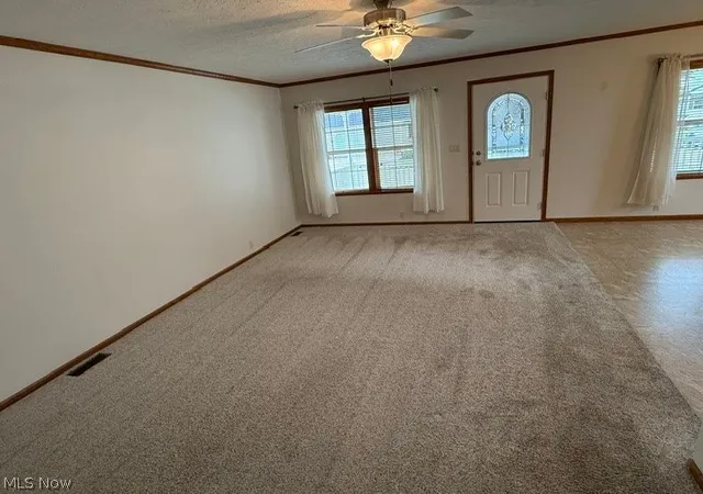 Photo 3 of Single family home for sale at 324 Gemini Dr, Dover, OH 44622 | MLS# 5241704 | Listing updated on 2026-09-30