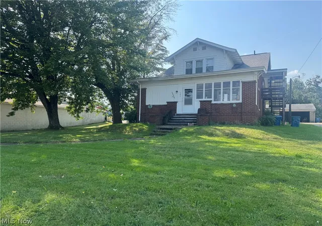 Photo 2 of Multi family home for sale at 521 S Prospect Ave, Hartville, OH 44632 | MLS# 5241794 | Listing updated on 2026-09-07