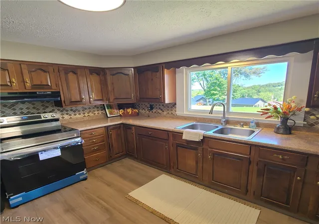 Photo 3 of Single family home for sale at 32 Market St, Mount Pleasant, OH 43939 | MLS# 5241734 | Listing updated on 2026-09-07