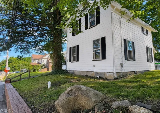 Photo 2 of Single family home for sale at 1312 Wooster Rd W, Barberton, OH 44203 | MLS# 5241995 | Listing updated on 2026-09-03