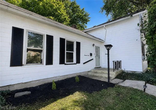 Photo 3 of Single family home for sale at 1312 Wooster Rd W, Barberton, OH 44203 | MLS# 5241995 | Listing updated on 2026-09-16