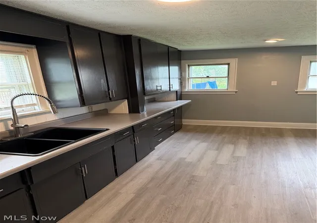 Photo 4 of Single family home for sale at 1054 Winton Ave, Akron, OH 44320 | MLS# 5231183 | Listing updated on 2026-09-03