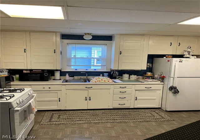 Photo 2 of Single family home for sale at 1937 9th Street Sw, Akron, OH 44314 | MLS# 5240195 | Listing updated on 2026-10-06
