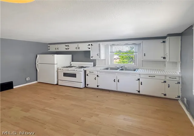 Photo 3 of Multi family home for sale at 1200 Wilbur Ave, Akron, OH 44301 | MLS# 5242446 | Listing updated on 2026-09-28
