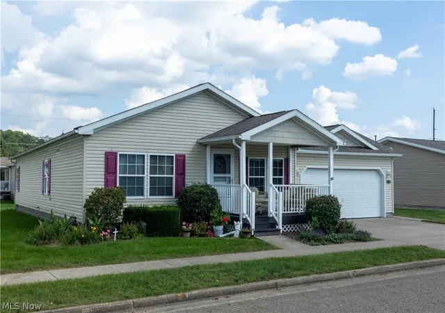 Photo 3 of Sale Pending at 310 Galaxy Dr, Dover, OH 44622 | MLS# 5242261 | Listing updated on 2026-09-08