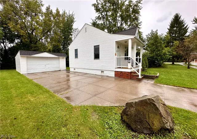 Photo 2 of Single family home for sale at 233 John St, Bedford, OH 44146 | MLS# 5242697 | Listing updated on 2026-09-29