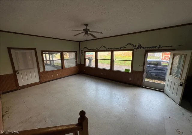 Photo 2 of Single family home for sale at 101 Mcconnell St, Uhrichsville, OH 44683 | MLS# 5242600 | Listing updated on 2026-09-15