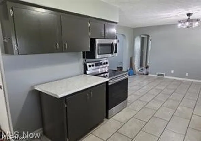 Photo 4 of Single family home for sale at 15090 Louisville St NE, Minerva, OH 44657 | MLS# 5243019 | Listing updated on 2026-10-01