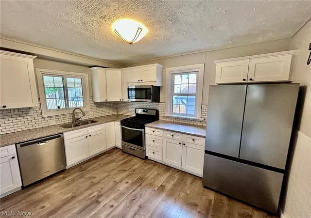 Photo 2 of Single family home for sale at 11921 Franklin Blvd, Lakewood, OH 44107 | MLS# 5243384 | Listing updated on 2026-09-10