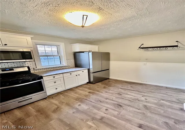 Photo 3 of Single family home for sale at 11921 Franklin Blvd, Lakewood, OH 44107 | MLS# 5243384 | Listing updated on 2026-09-17