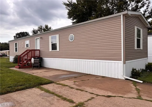 Photo 1 of Single family home for sale at 121 Tracy Dr, Dover, OH 44622 | MLS# 5243447 | Listing updated on 2026-09-10