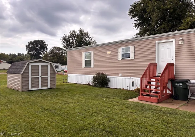 Photo 2 of Single family home for sale at 121 Tracy Dr, Dover, OH 44622 | MLS# 5243447 | Listing updated on 2026-09-10