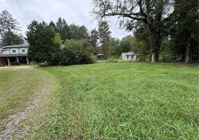 Photo 2 of Single family home for sale at 20 Harmony Hills Dr, Akron, OH 44321 | MLS# 5243948 | Listing updated on 2026-09-28