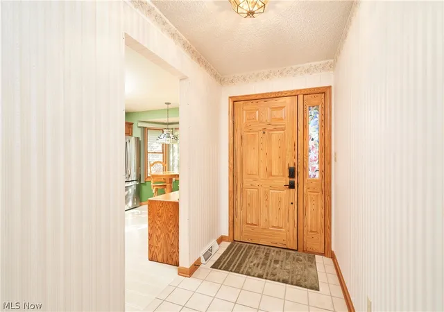 Photo 3 of Condo for sale at 1353 S Azalea Blvd, Barberton, OH 44203 | MLS# 5243785 | Listing updated on 2026-09-18