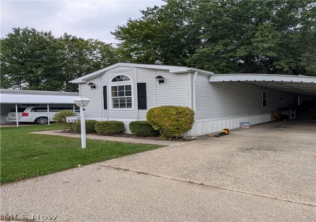 Photo 2 of Single family home for sale at 316 Britton Dr, Geneva, OH 44041 | MLS# 5243665 | Listing updated on 2026-09-11