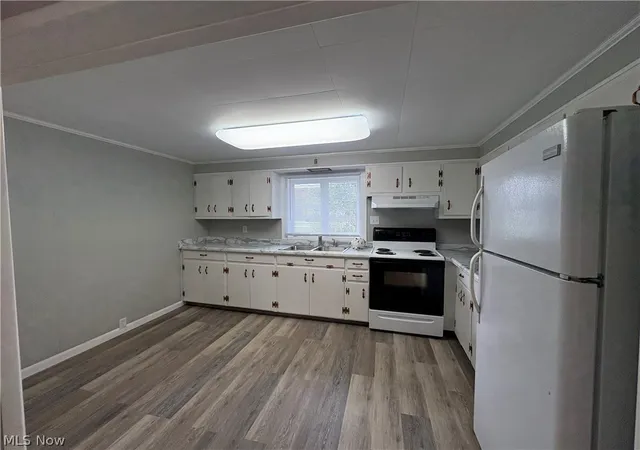 Photo 2 of Single family home for sale at 210 W 3rd Street, Uhrichsville, OH 44683 | MLS# 5244234 | Listing updated on 2026-10-01
