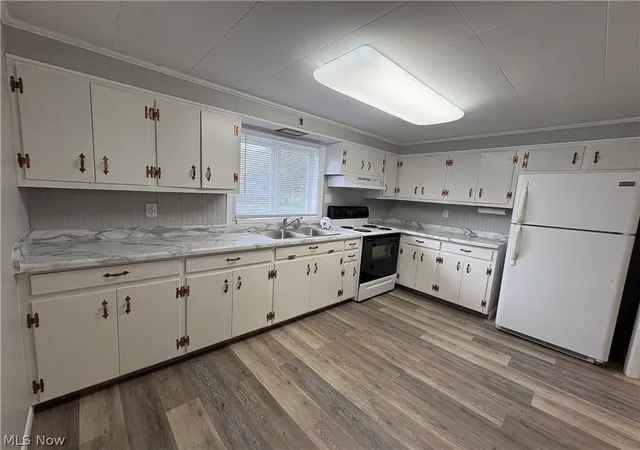 Photo 3 of Single family home for sale at 210 W 3rd Street, Uhrichsville, OH 44683 | MLS# 5244234 | Listing updated on 2026-10-01