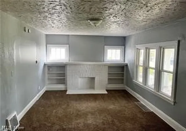 Photo 3 of Single family home for sale at 681 Moreley Ave, Akron, OH 44320 | MLS# 5244281 | Listing updated on 2026-09-26