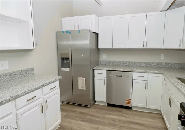 Photo 2 of Single family home for sale at 911 West Dr, Sheffield Lake, OH 44054 | MLS# 5241981 | Listing updated on 2026-09-13
