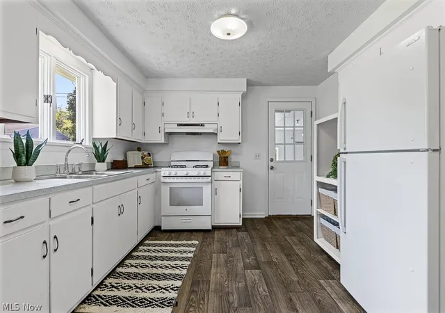 Photo 3 of Single family home for sale at 1902 Root Ave NE, Canton, OH 44705 | MLS# 5243715 | Listing updated on 2026-10-05