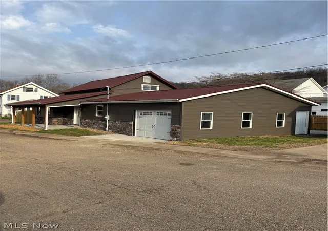 Photo 2 of Single family home for sale at 241 Mckinley Ave, Newcomerstown, OH 43832 | MLS# 5244669 | Listing updated on 2026-09-14