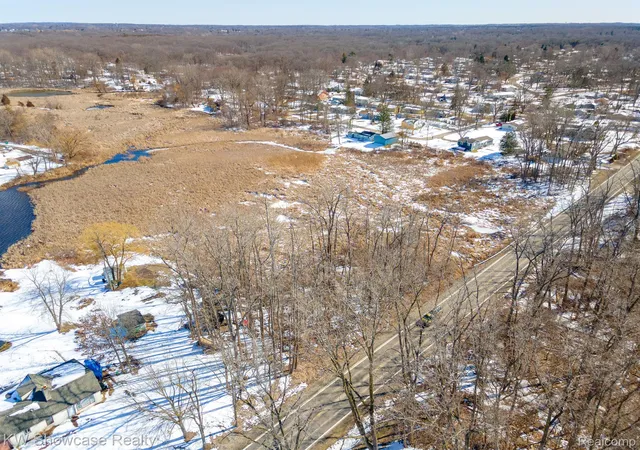Photo 2 of Land for sale at Vacant Carroll Lake Rd, Commerce Charter Township Oakland, MI 48390 | MLS# 20230018526 | Listing updated on 2026-09-07