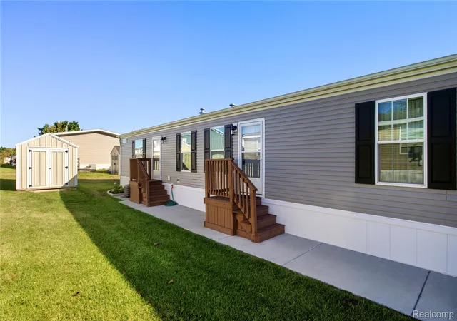 Photo 1 of Single family home for sale at 230 E Macgregor Ct, Highland, MI 48357 | MLS# 20261001909 | Listing updated on 2026-10-11