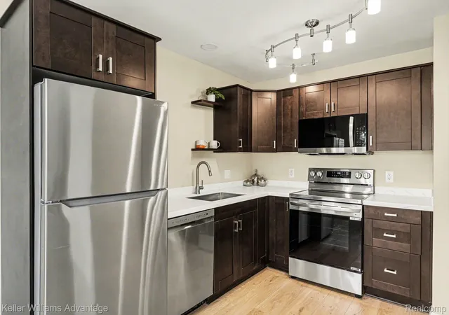 Listing Photo 1 - Condo for sale in building located at 32718 Grand River Ave, Farmington Hills Oakland, MI 48336 - Unit #C10
