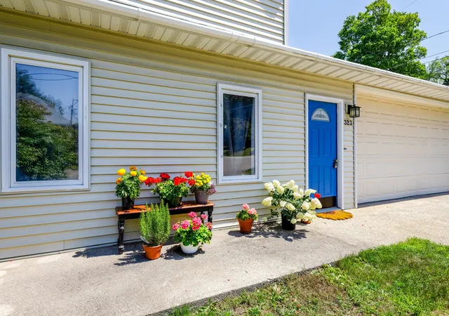 Photo 3 of Single family home for sale at 323 Benzie Ct, Beulah, MI 49617 | MLS# 78080070250 | Listing updated on 2026-09-07