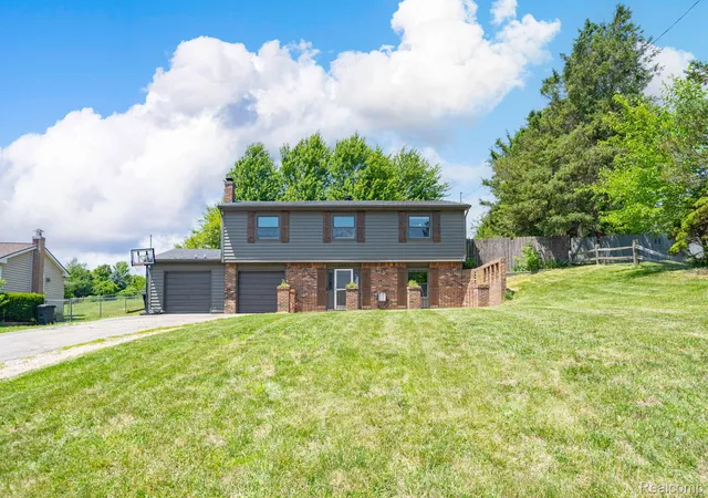 Single family home for sale at 4069 Loch Dr, Highland, MI 48357 | MLS# 20261050646